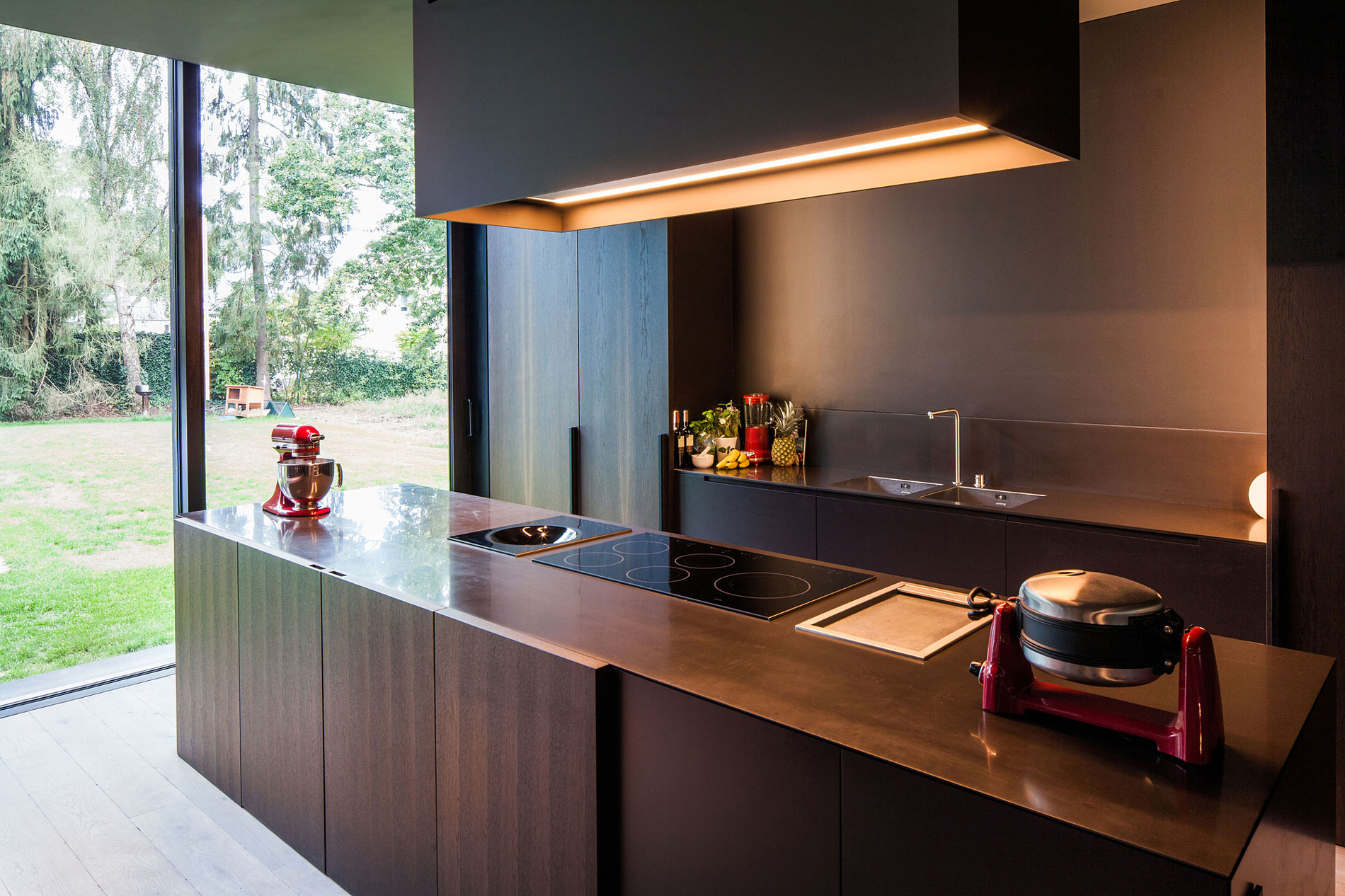 A Former Hunting Lodge Transformed into a Sleek Modern Family Home in Heverlee, Belgium by DMOA Architecten (17)