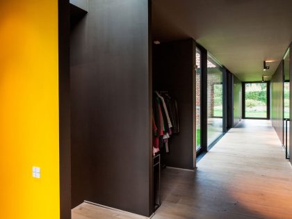 A Former Hunting Lodge Transformed into a Sleek Modern Family Home in Heverlee, Belgium by DMOA Architecten (19)