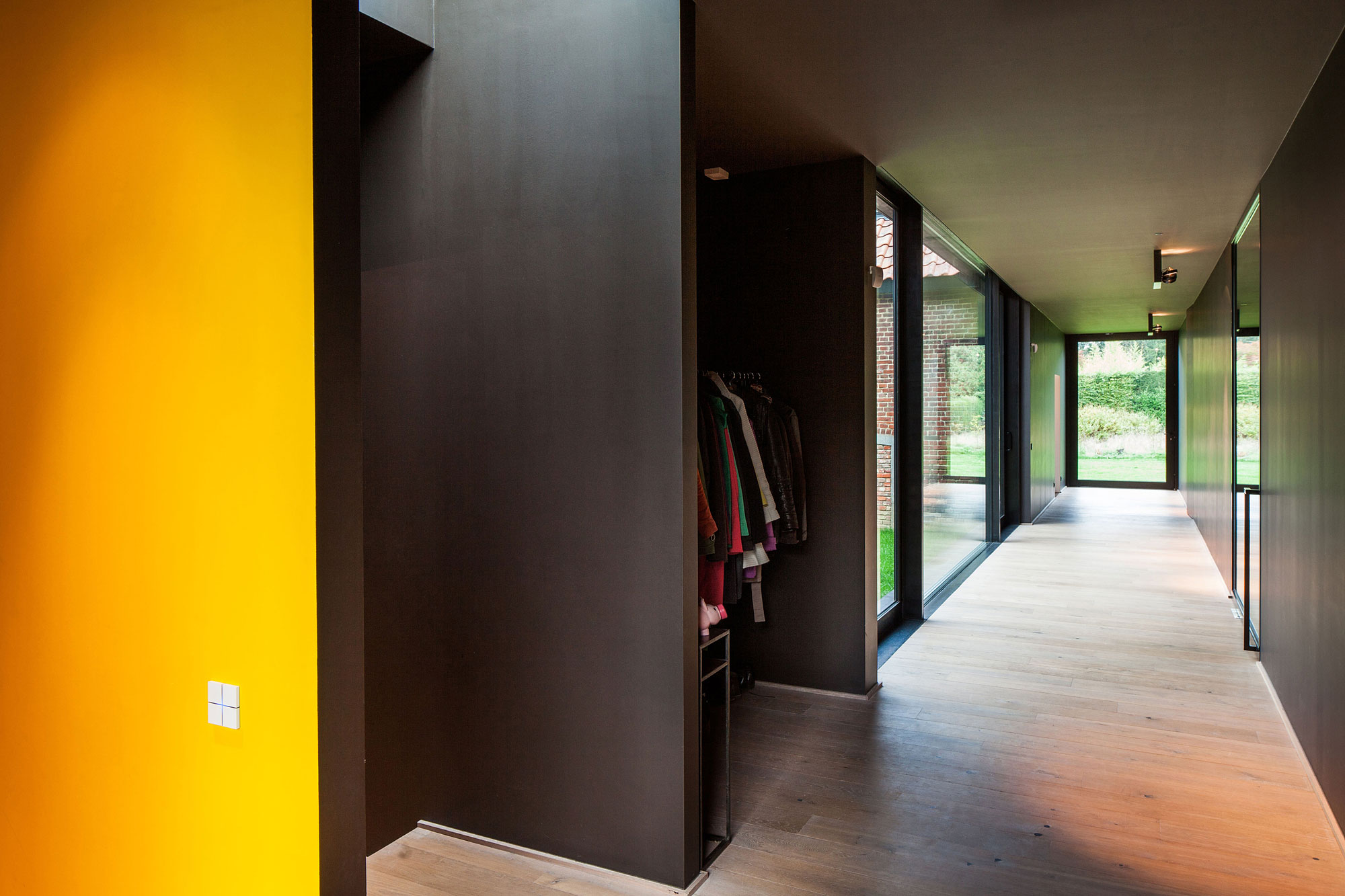 A Former Hunting Lodge Transformed into a Sleek Modern Family Home in Heverlee, Belgium by DMOA Architecten (19)