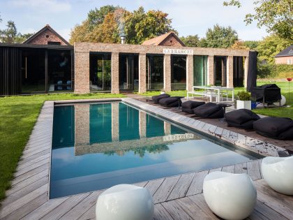 A Former Hunting Lodge Transformed into a Sleek Modern Family Home in Heverlee, Belgium by DMOA Architecten (3)