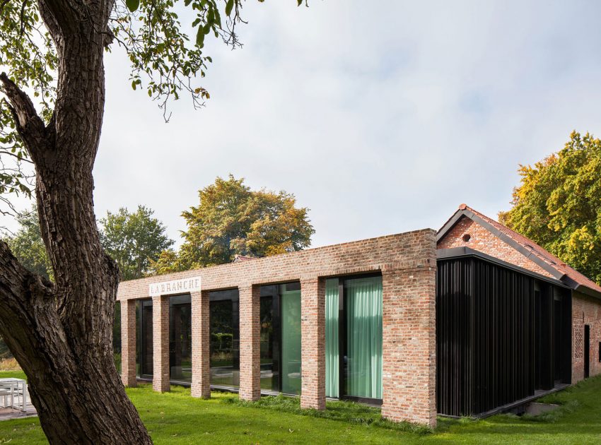 A Former Hunting Lodge Transformed into a Sleek Modern Family Home in Heverlee, Belgium by DMOA Architecten (4)