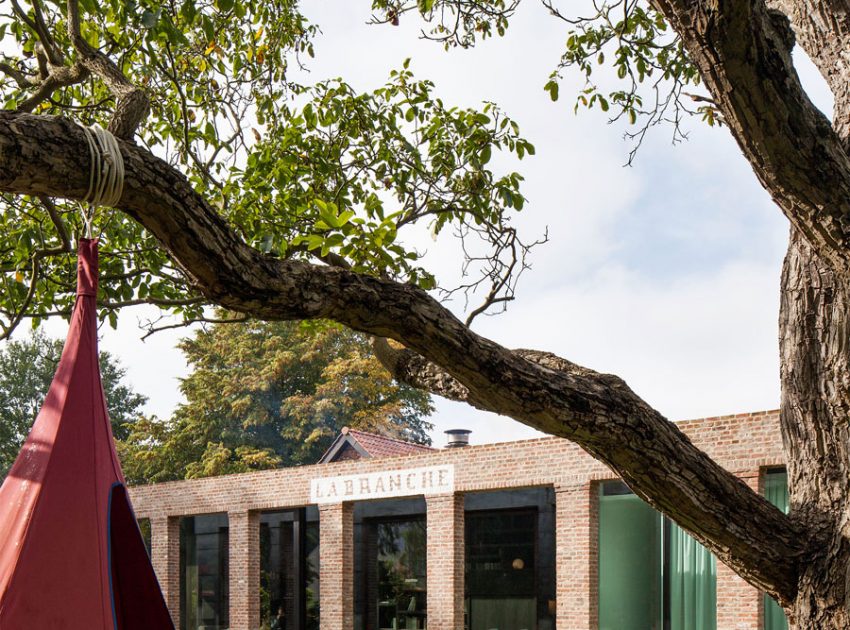 A Former Hunting Lodge Transformed into a Sleek Modern Family Home in Heverlee, Belgium by DMOA Architecten (5)