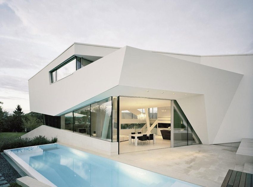 A Futuristic Modern White Home with Sleek and Stunning Views in Vienna by Project A01 Architects (10)
