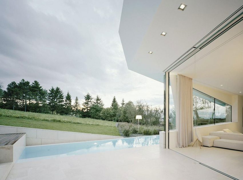 A Futuristic Modern White Home with Sleek and Stunning Views in Vienna by Project A01 Architects (12)