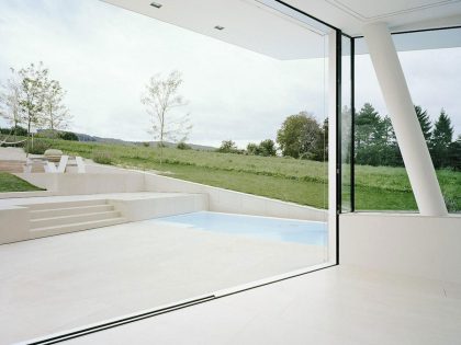 A Futuristic Modern White Home with Sleek and Stunning Views in Vienna by Project A01 Architects (13)