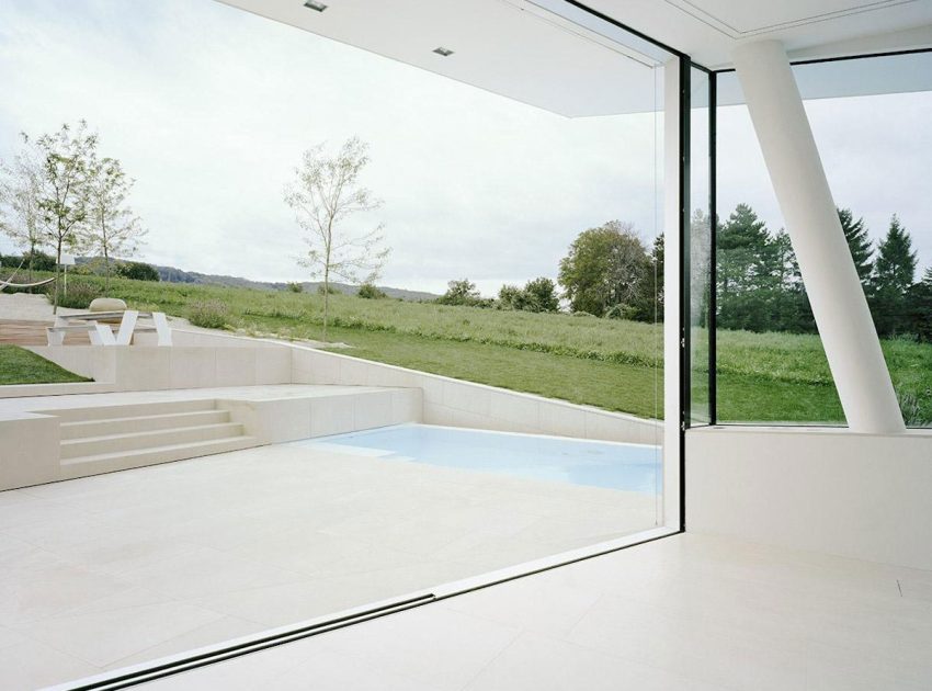 A Futuristic Modern White Home with Sleek and Stunning Views in Vienna by Project A01 Architects (13)