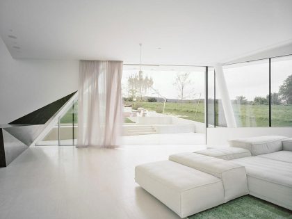 A Futuristic Modern White Home with Sleek and Stunning Views in Vienna by Project A01 Architects (14)