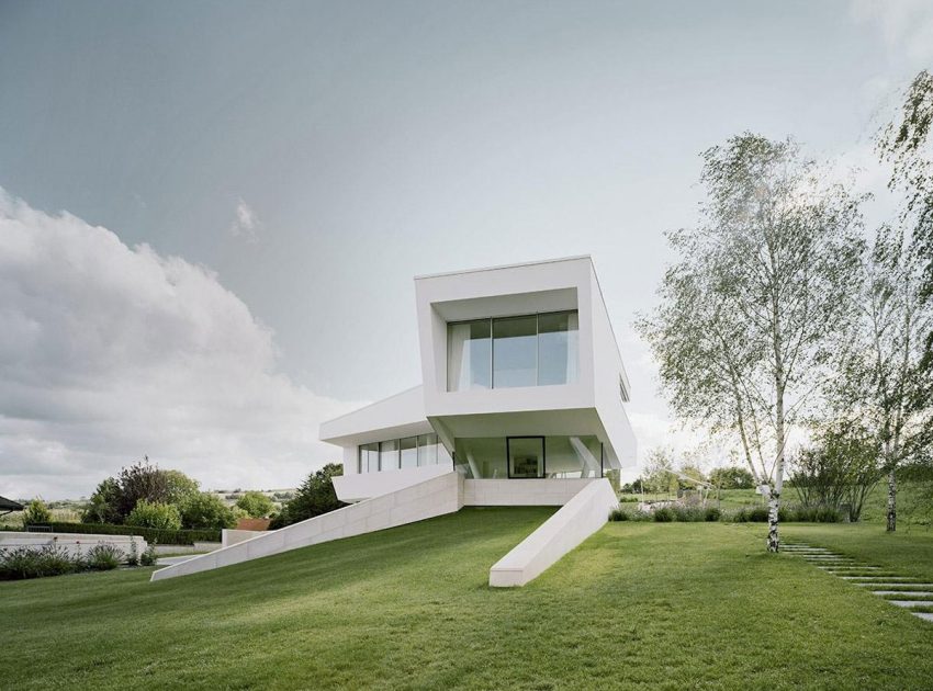 A Futuristic Modern White Home with Sleek and Stunning Views in Vienna by Project A01 Architects (4)