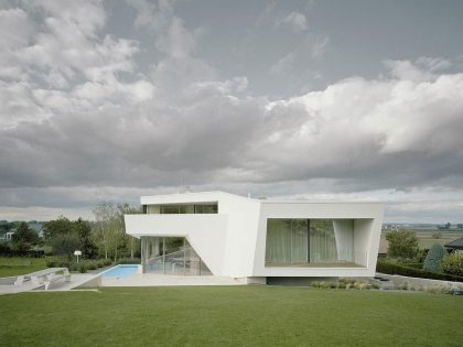 A Futuristic Modern White Home with Sleek and Stunning Views in Vienna by Project A01 Architects (7)