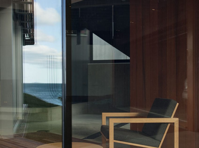 A Geometric Modern Beachfront Home Composed of Three Separate Structures in New Zealand by Athfield Architects (10)