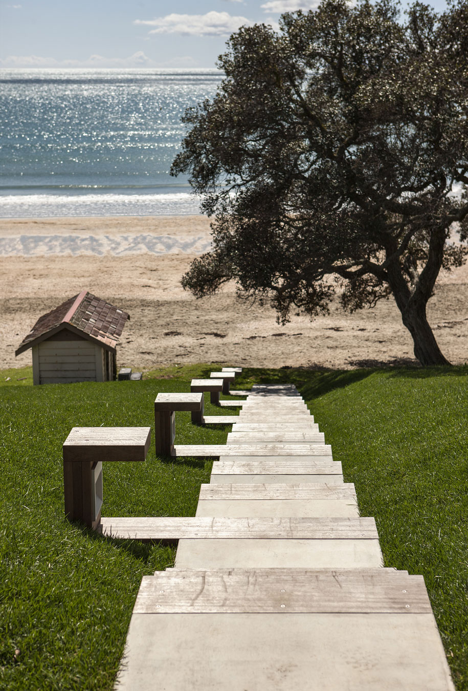 A Geometric Modern Beachfront Home Composed of Three Separate Structures in New Zealand by Athfield Architects (11)