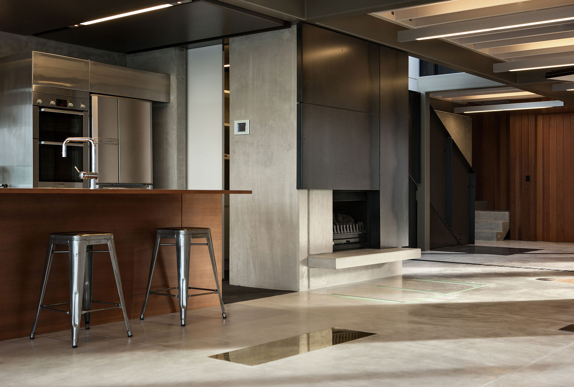 A Geometric Modern Beachfront Home Composed of Three Separate Structures in New Zealand by Athfield Architects (12)