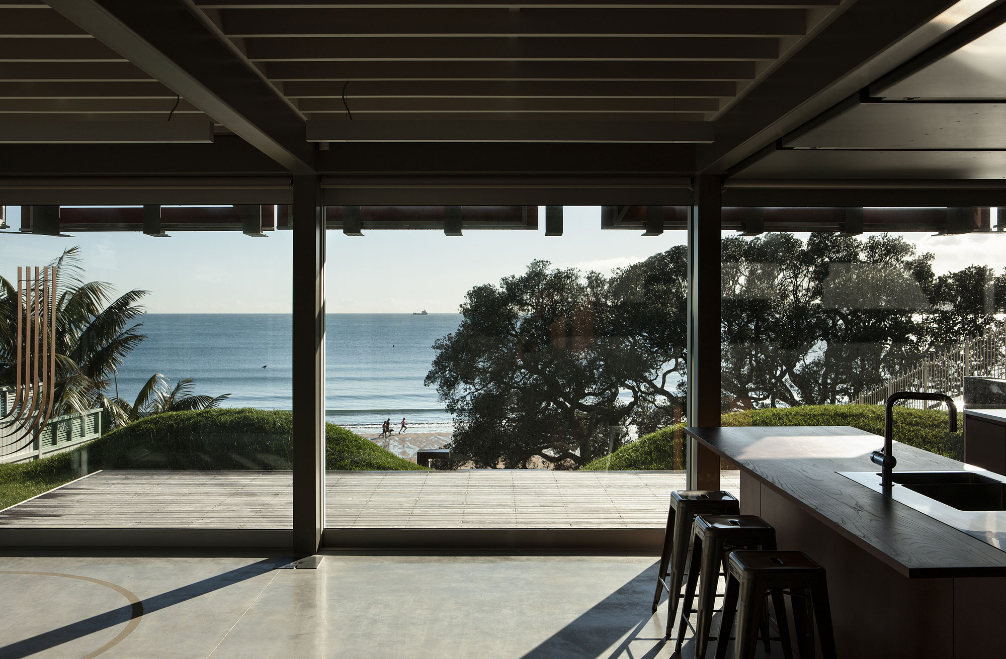 A Geometric Modern Beachfront Home Composed of Three Separate Structures in New Zealand by Athfield Architects (14)