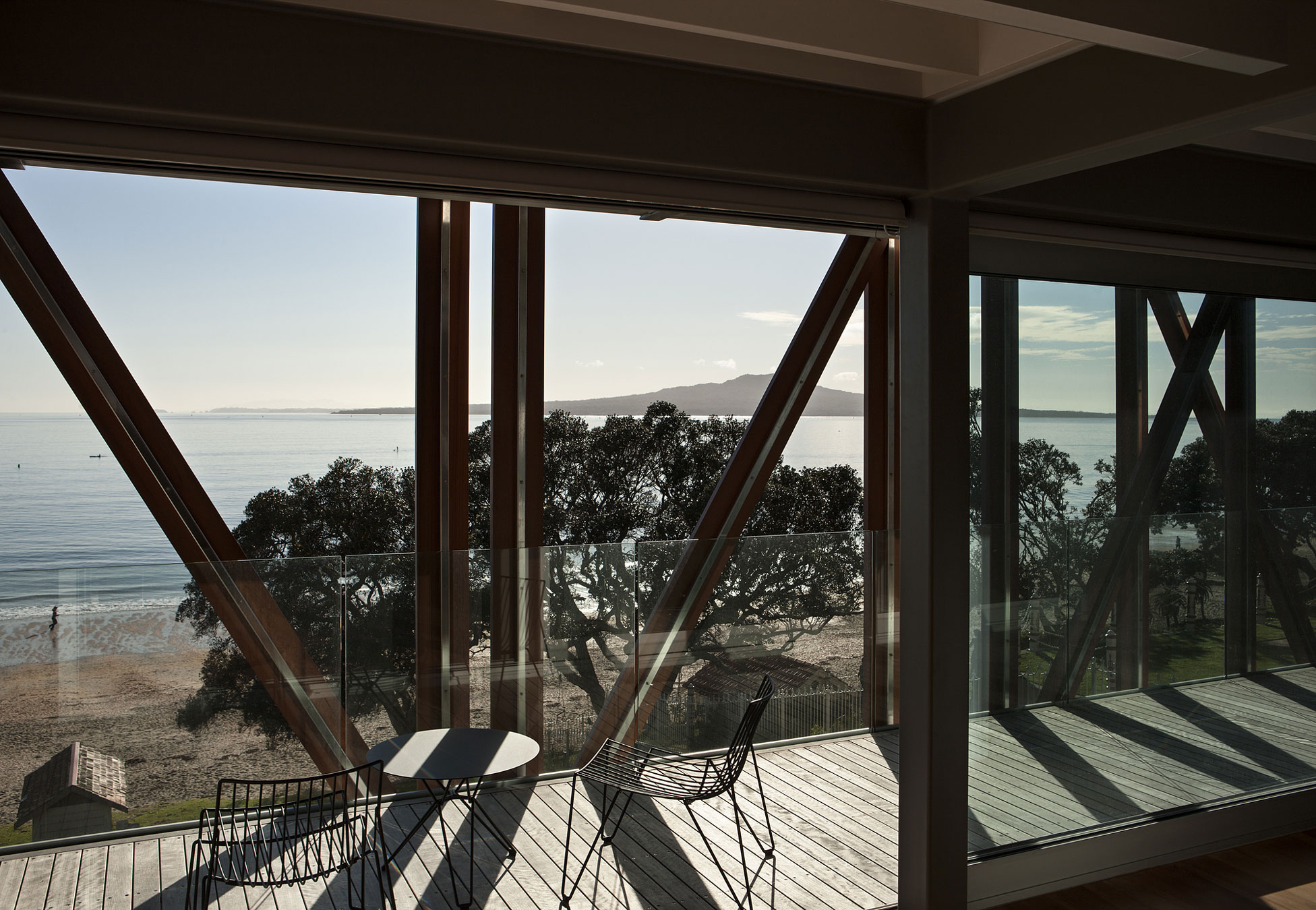 A Geometric Modern Beachfront Home Composed of Three Separate Structures in New Zealand by Athfield Architects (15)