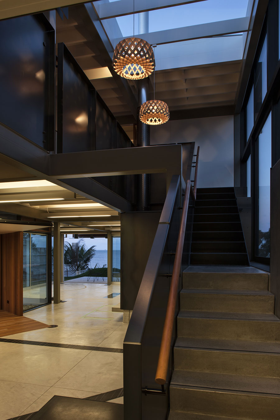 A Geometric Modern Beachfront Home Composed of Three Separate Structures in New Zealand by Athfield Architects (16)