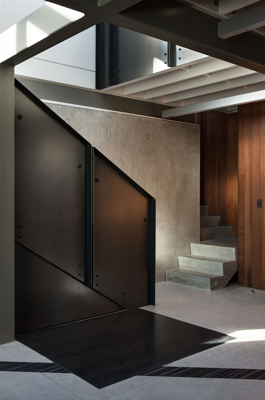 A Geometric Modern Beachfront Home Composed of Three Separate Structures in New Zealand by Athfield Architects (18)