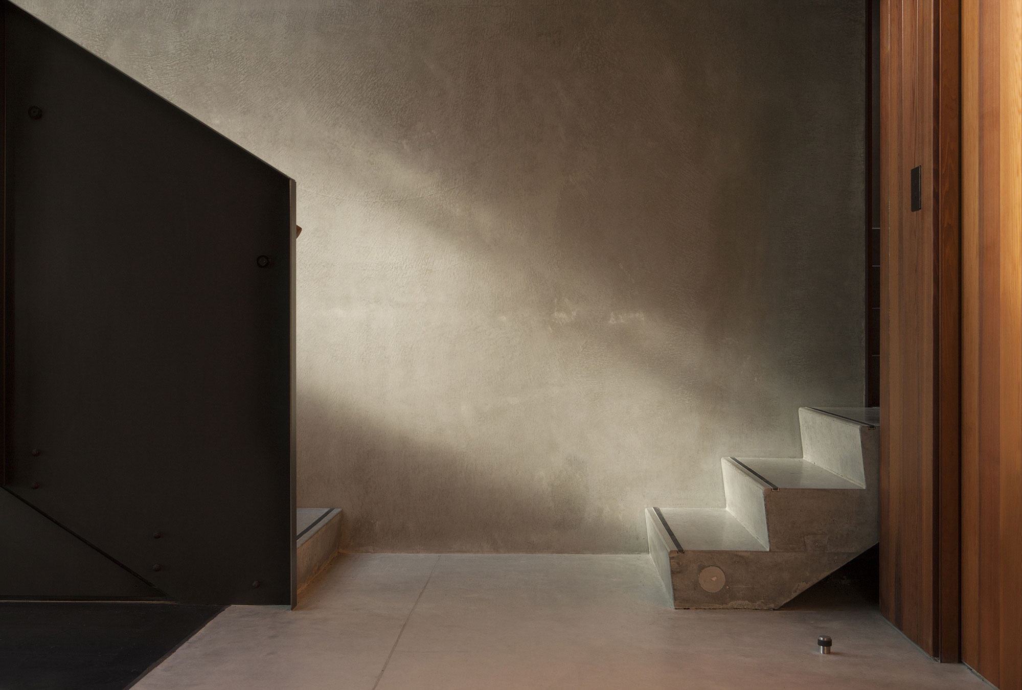 A Geometric Modern Beachfront Home Composed of Three Separate Structures in New Zealand by Athfield Architects (19)