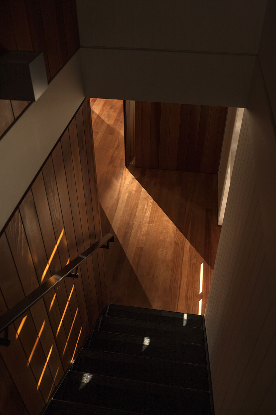 A Geometric Modern Beachfront Home Composed of Three Separate Structures in New Zealand by Athfield Architects (22)