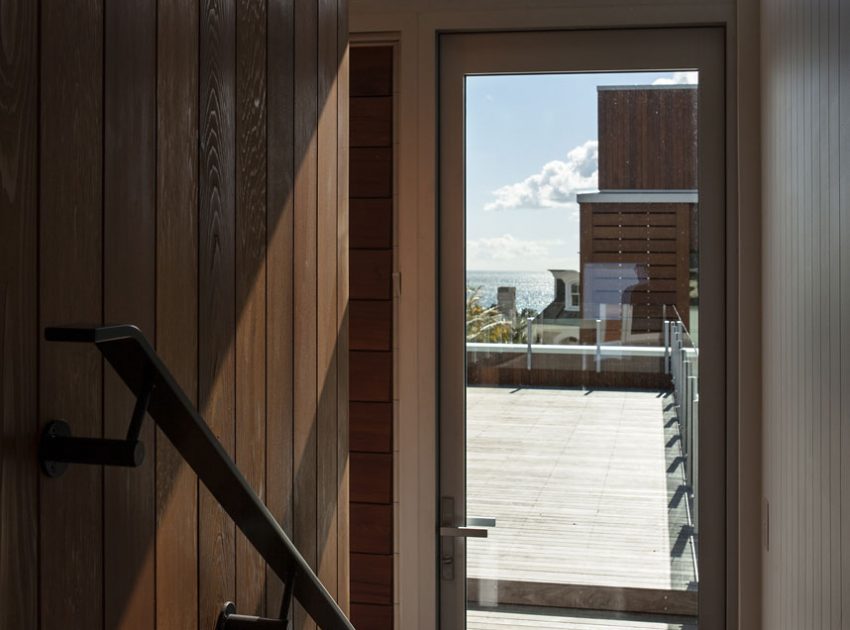 A Geometric Modern Beachfront Home Composed of Three Separate Structures in New Zealand by Athfield Architects (23)