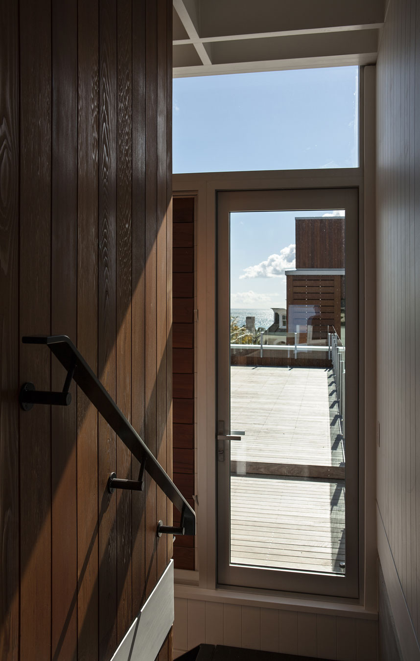 A Geometric Modern Beachfront Home Composed of Three Separate Structures in New Zealand by Athfield Architects (23)