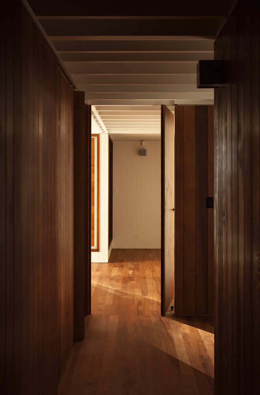 A Geometric Modern Beachfront Home Composed of Three Separate Structures in New Zealand by Athfield Architects (24)