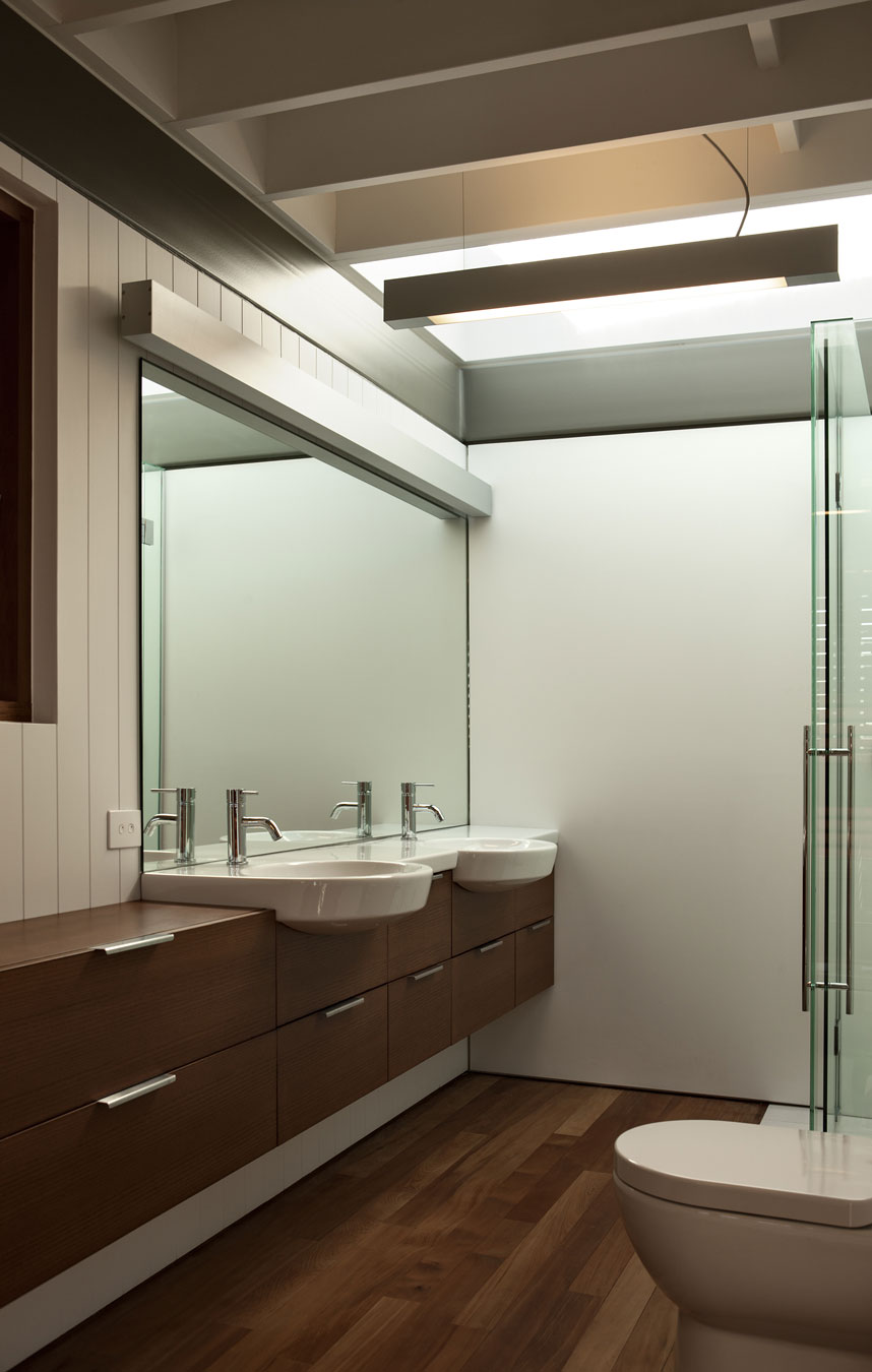 A Geometric Modern Beachfront Home Composed of Three Separate Structures in New Zealand by Athfield Architects (27)