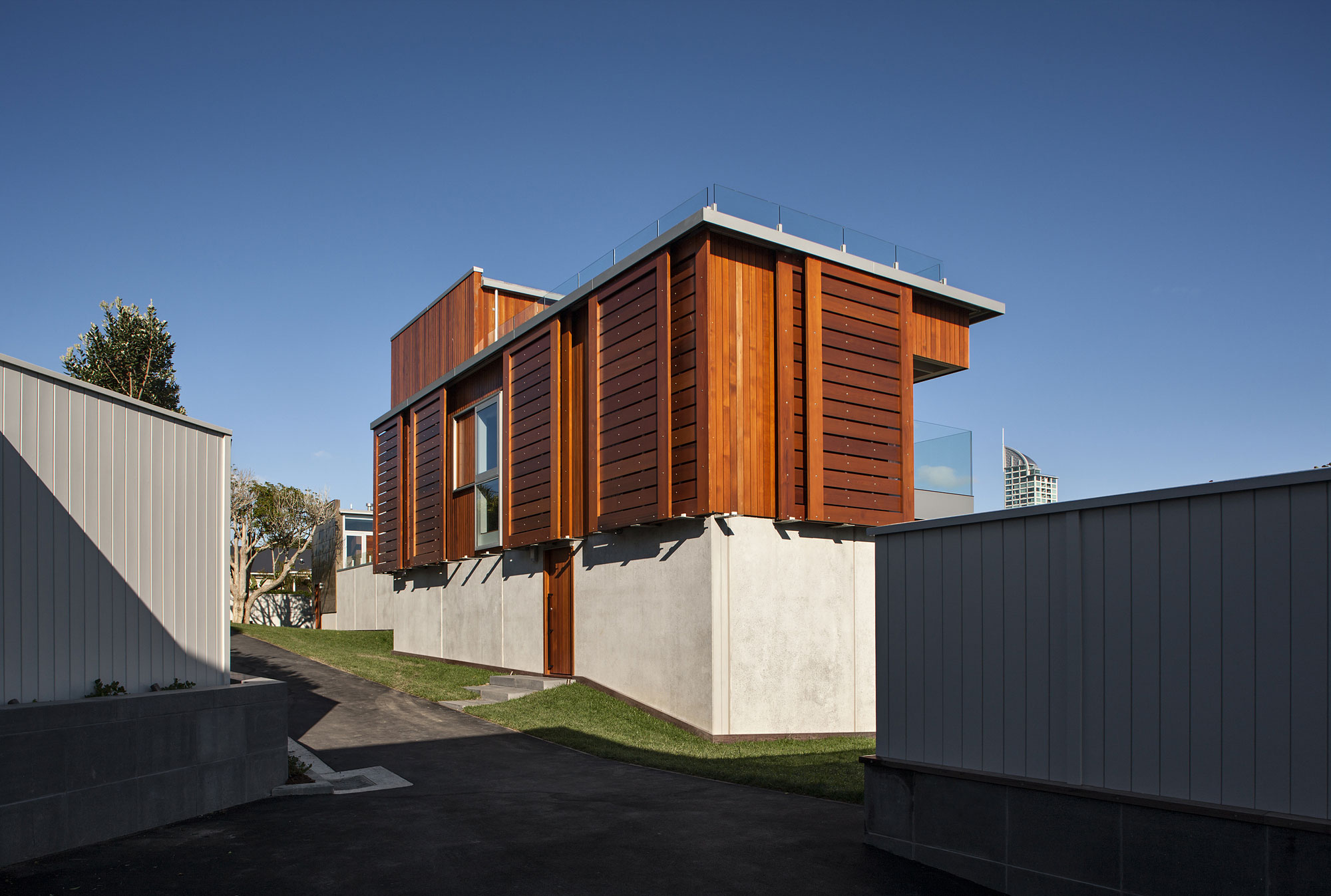 A Geometric Modern Beachfront Home Composed of Three Separate Structures in New Zealand by Athfield Architects (5)