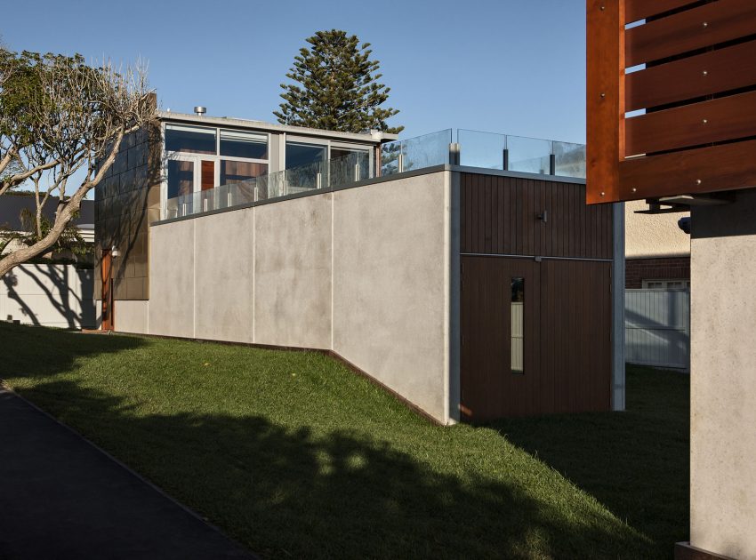 A Geometric Modern Beachfront Home Composed of Three Separate Structures in New Zealand by Athfield Architects (7)