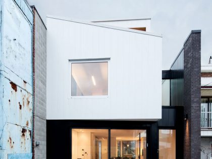 A Home with a Brick Front and a Monochrome Back for Family of Four in Montreal by NatureHumaine (1)