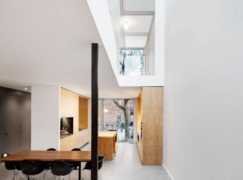 A Home with a Brick Front and a Monochrome Back for Family of Four in Montreal by NatureHumaine (12)