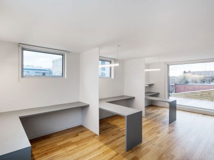 A Home with a Brick Front and a Monochrome Back for Family of Four in Montreal by NatureHumaine (20)