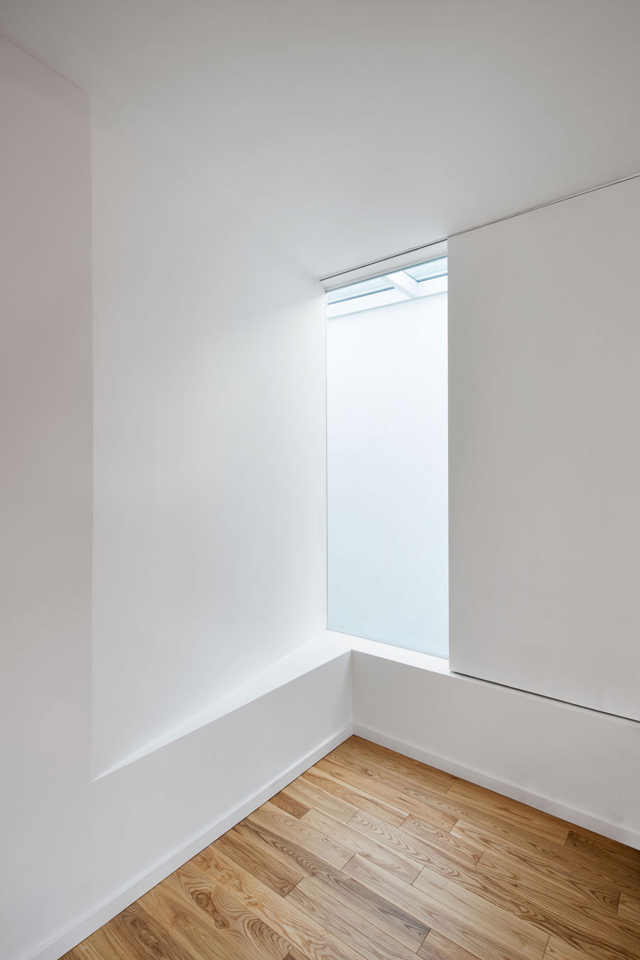 A Home with a Brick Front and a Monochrome Back for Family of Four in Montreal by NatureHumaine (21)