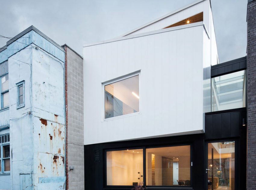 A Home with a Brick Front and a Monochrome Back for Family of Four in Montreal by NatureHumaine (3)