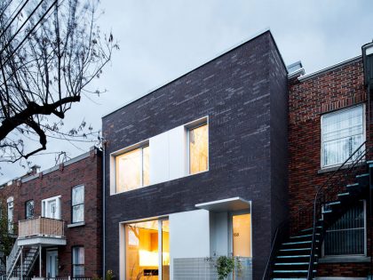 A Home with a Brick Front and a Monochrome Back for Family of Four in Montreal by NatureHumaine (4)