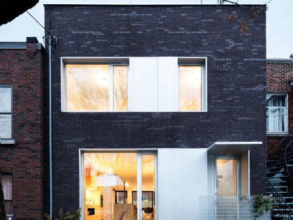 A Home with a Brick Front and a Monochrome Back for Family of Four in Montreal by NatureHumaine (5)