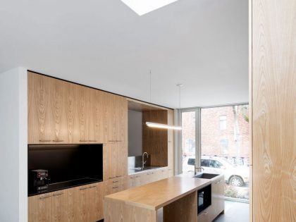 A Home with a Brick Front and a Monochrome Back for Family of Four in Montreal by NatureHumaine (8)