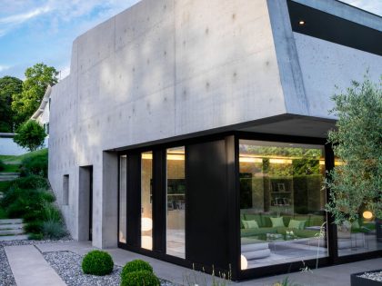 A Magnificent and Stylish Concrete House for Families with Two Children in Geneva