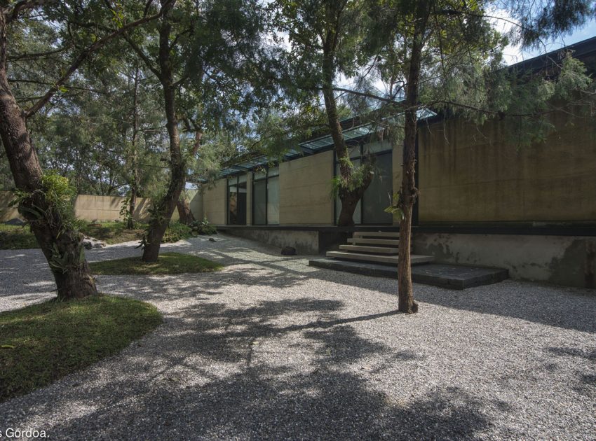 A Modern Concrete Home Surrounded by Trees and Vegetation Embrace in Morelos by Taller|A arquitectos (1)