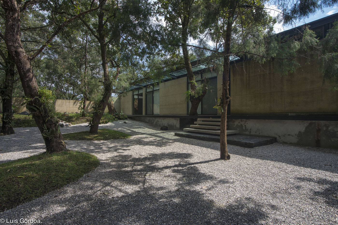 A Modern Concrete Home Surrounded by Trees and Vegetation Embrace in Morelos by Taller|A arquitectos (1)