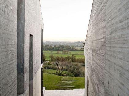 A Modern House with Stone on the Outside and Exposed Concrete on the Inside in El Ampurdán by b720 Fermín Vázquez Arquitectos (10)