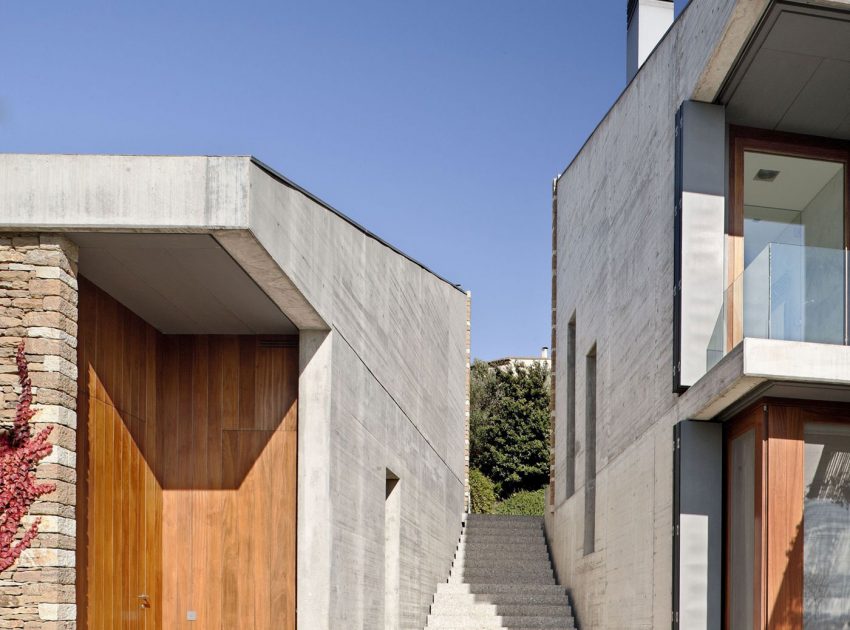 A Modern House with Stone on the Outside and Exposed Concrete on the Inside in El Ampurdán by b720 Fermín Vázquez Arquitectos (9)