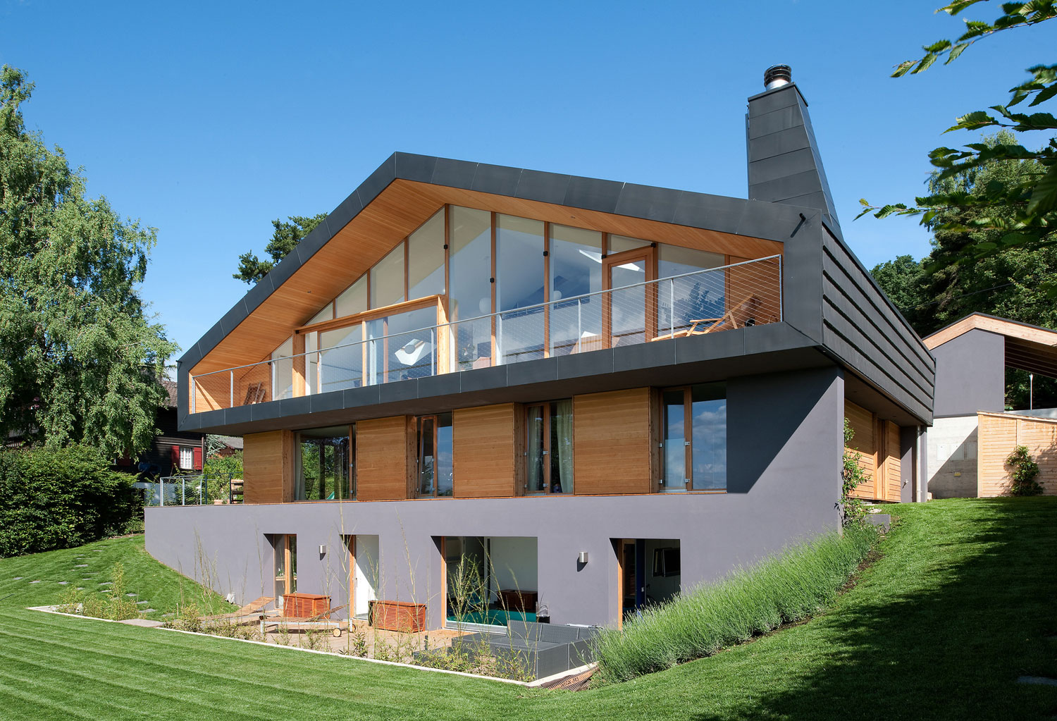 A Playful Contemporary Home Surrounded by Wildlife and Breathtaking Views in Genolier, Switzerland by LRS Architectes (1)