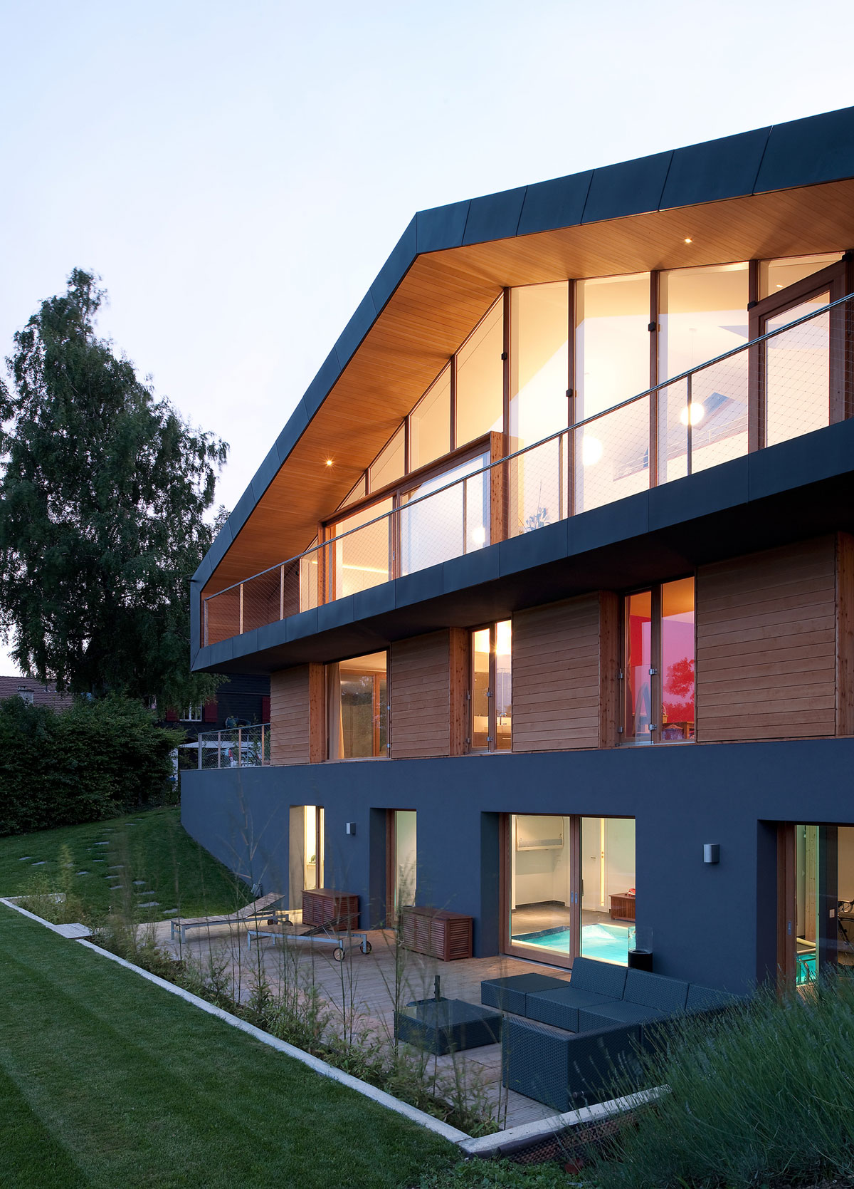 A Playful Contemporary Home Surrounded by Wildlife and Breathtaking Views in Genolier, Switzerland by LRS Architectes (11)