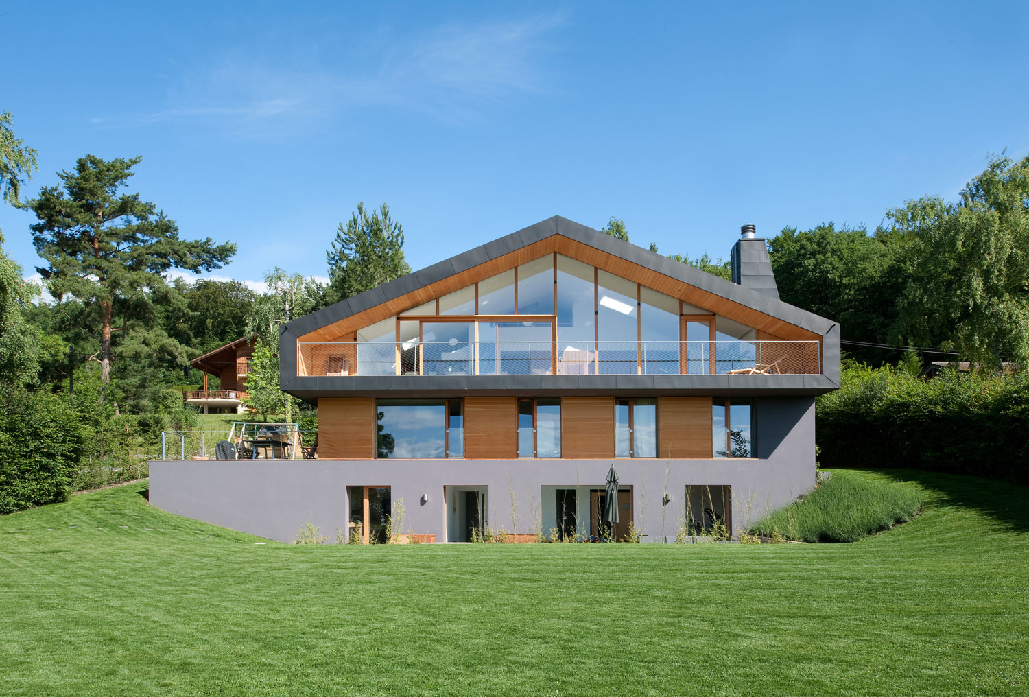 A Playful Contemporary Home Surrounded by Wildlife and Breathtaking Views in Genolier, Switzerland by LRS Architectes (2)
