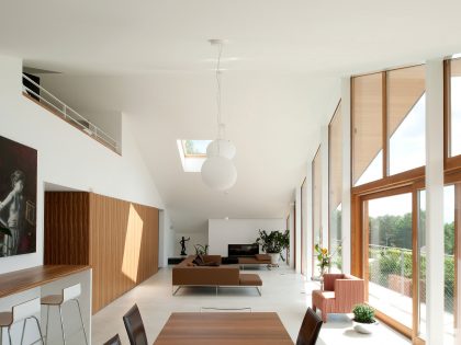 A Playful Contemporary Home Surrounded by Wildlife and Breathtaking Views in Genolier, Switzerland by LRS Architectes (8)