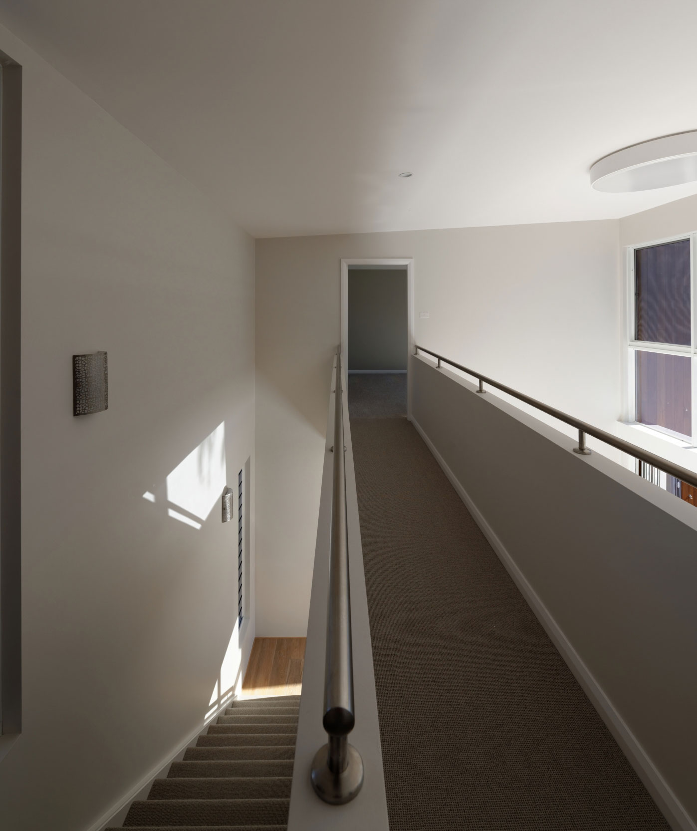 A Sleek and Stylish Sustainable Home for a Young Family in Newcastle by Bourne Blue Architecture (11)