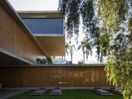 A Spacious Concrete House with Rich and Warm Interior Tones in São Paulo by Studio MK27 & Lair Reis (5)