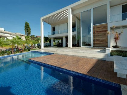 A Spacious Contemporary Home with High Ceilings and Tall Glass Walls in Goiânia, Brazil by Dayala+Rafael Arquitetura (2)