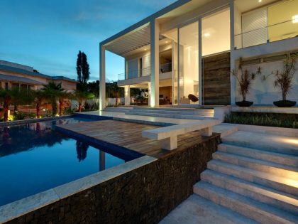 A Spacious Contemporary Home with High Ceilings and Tall Glass Walls in Goiânia, Brazil by Dayala+Rafael Arquitetura (9)