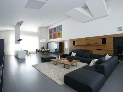 A Spacious House with Wood Elements and White Walls on the Edge of the Forest in Dnipropetrovsk